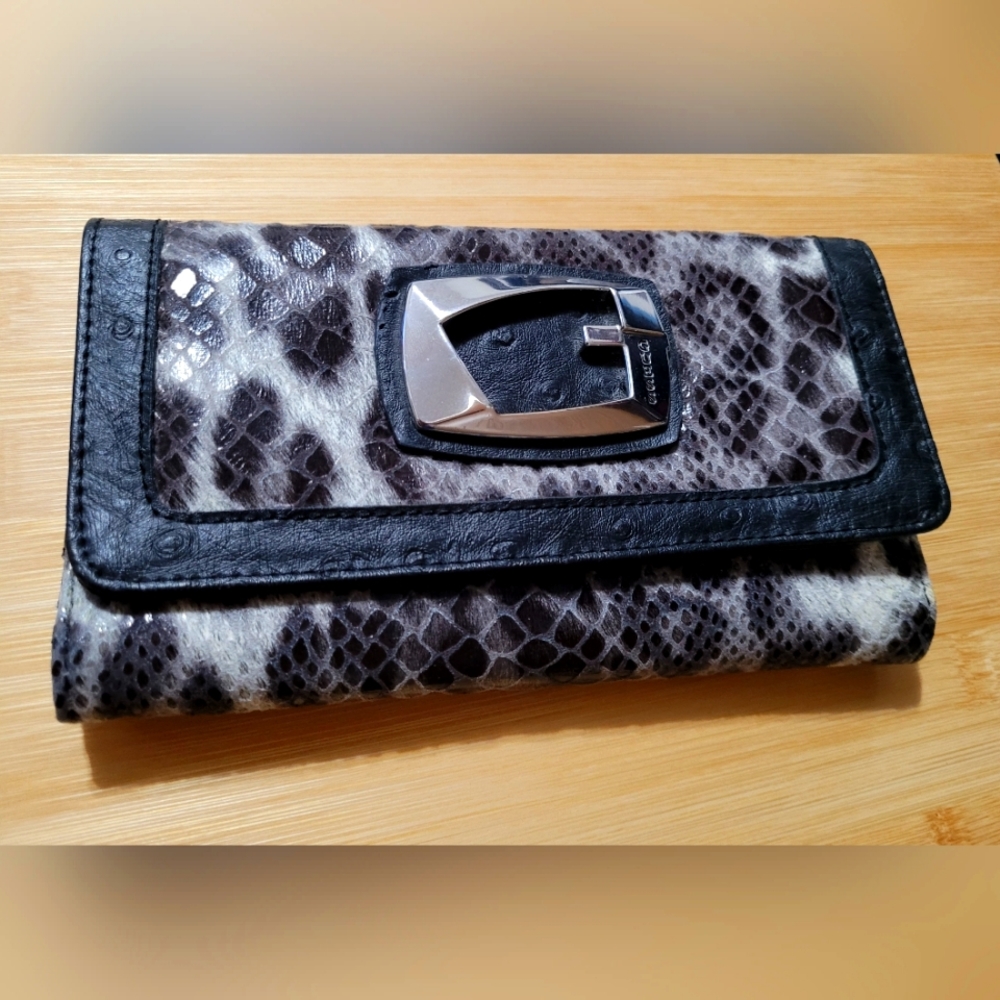 Guess snake and ostrich print wallet.